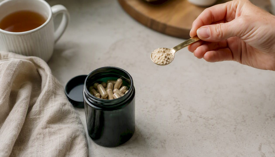 Hand measuring quercetin powder near capsules